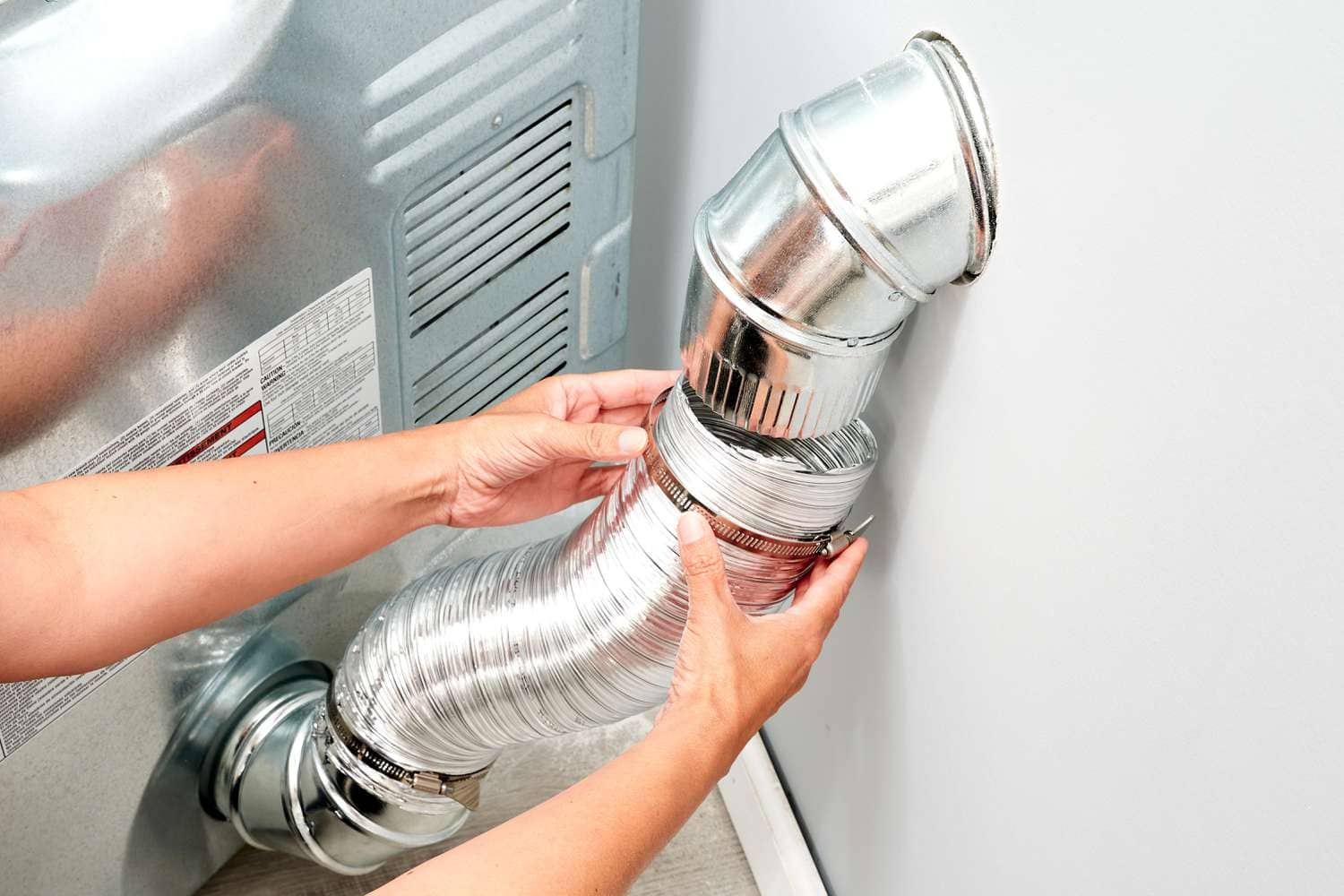Dryer vent ducting being reconnected