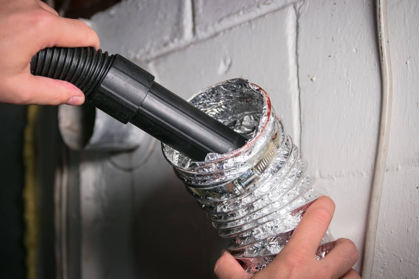 Dryer vent line being cleaned out