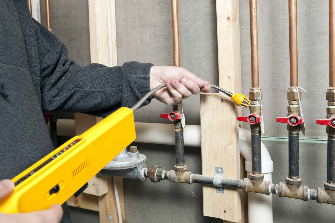 Genesis technician brazing a gas line connection
